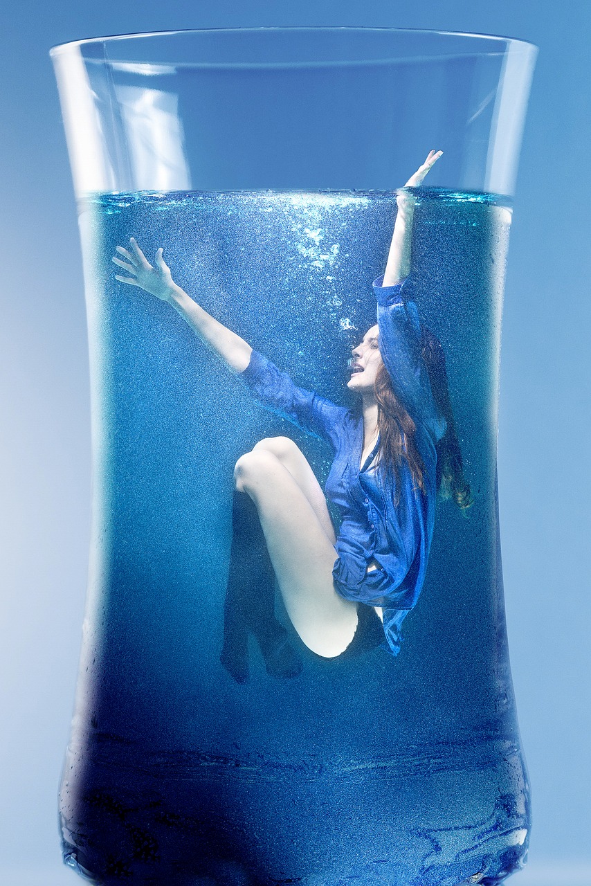 Image - woman water submerged glass