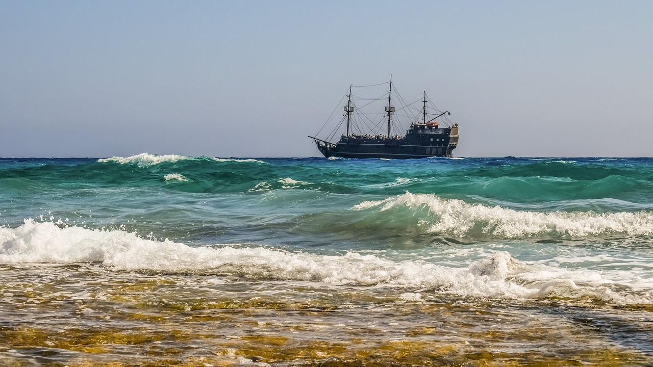 Image - sea rocky coast waves cruise ship