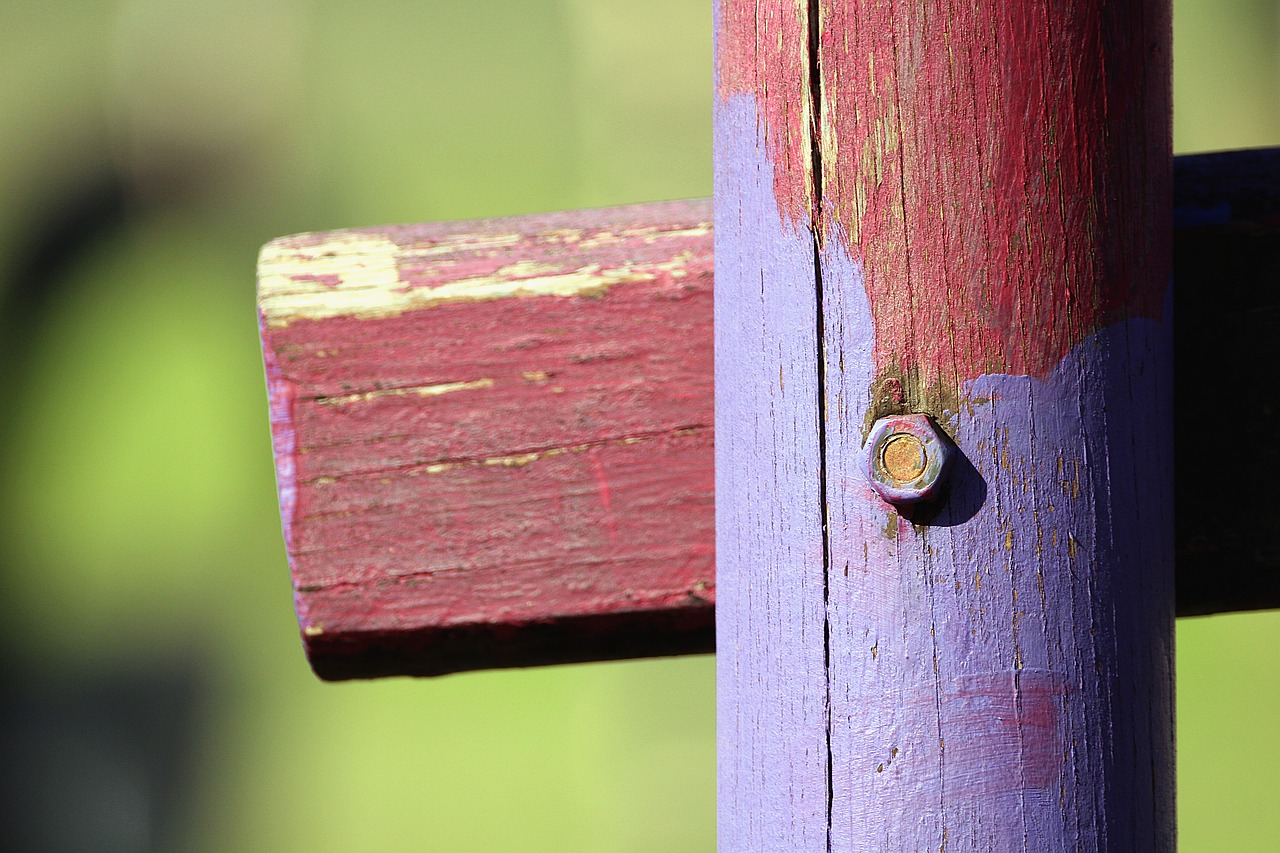 Image - wood pile screw mother cross