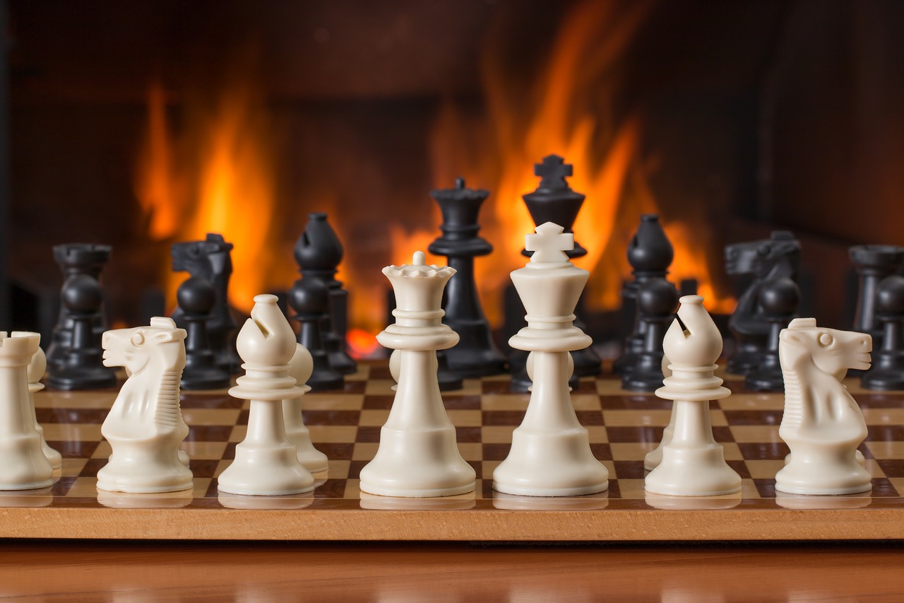 Image - chess board game fireside strategy