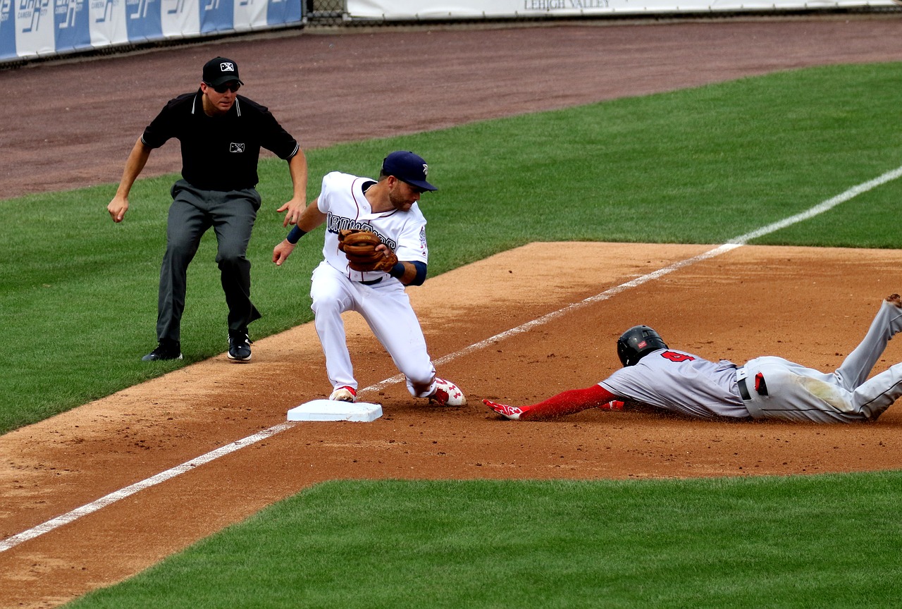 Image - out slide baseball third base play