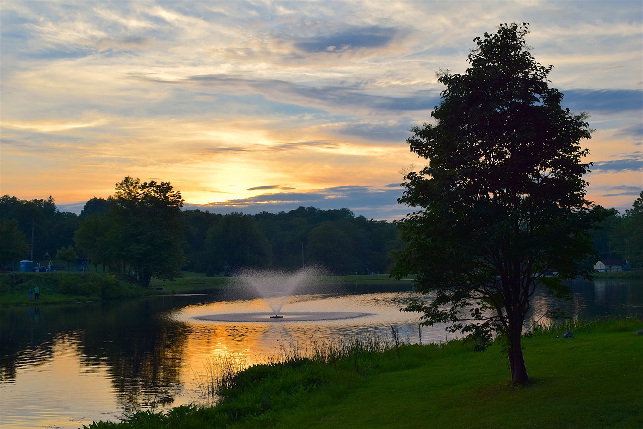 Image - sunset pond fountain water park