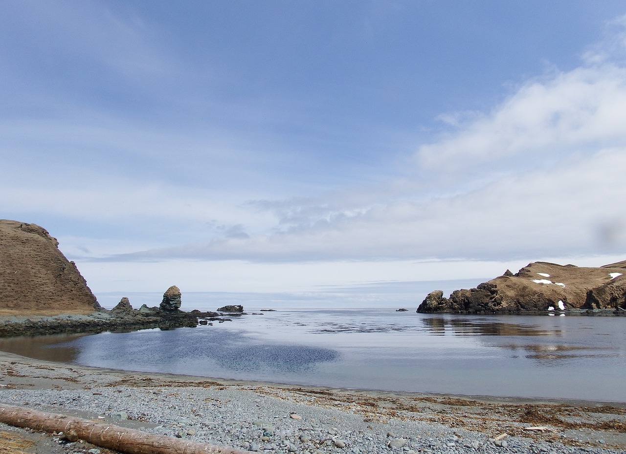 Image - bay ocean beach rocks spring snow