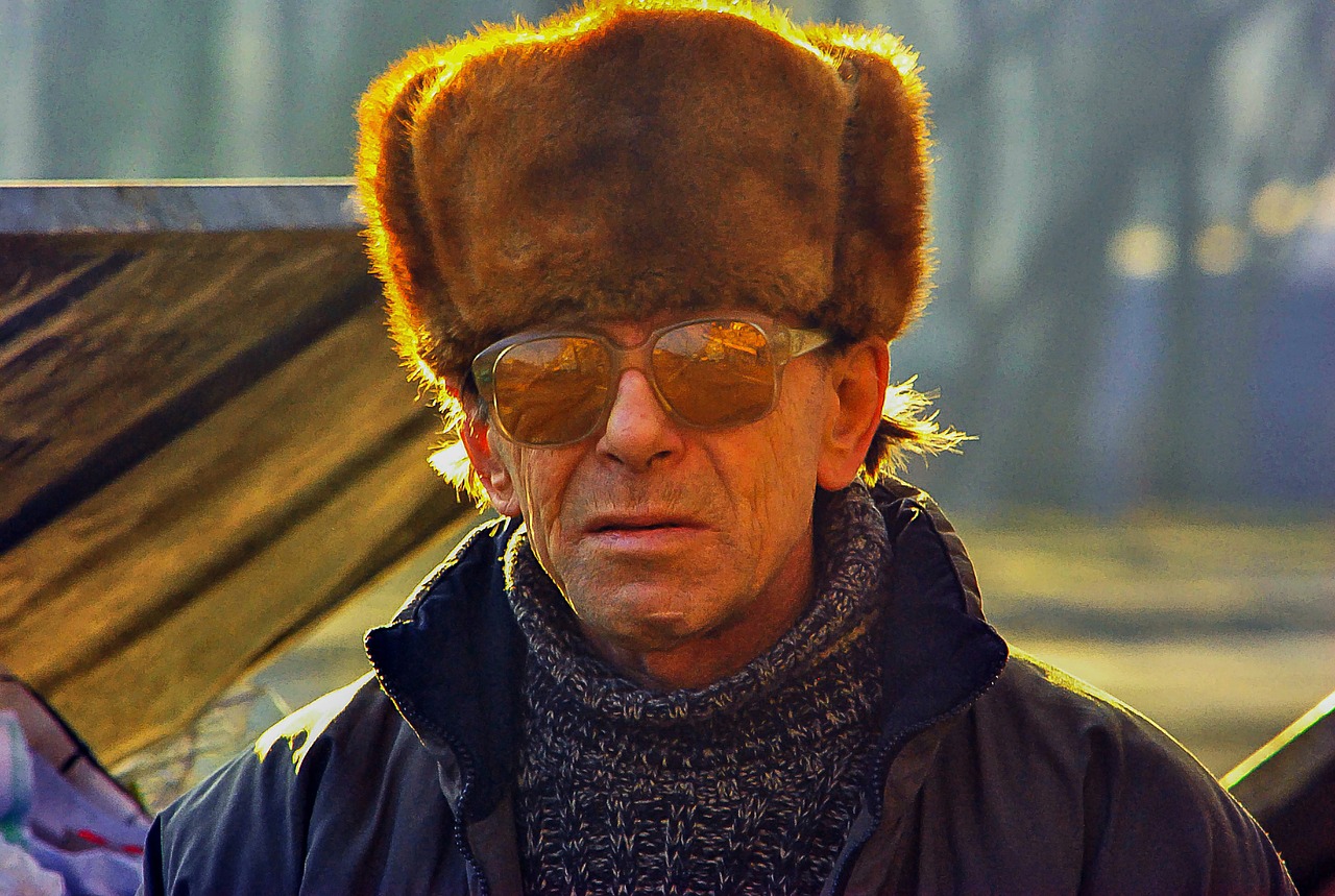 Image - man portrait glasses cap winter