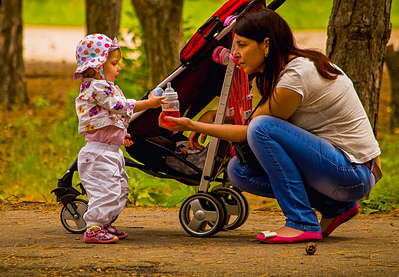 Image - mom daughter baby pram park