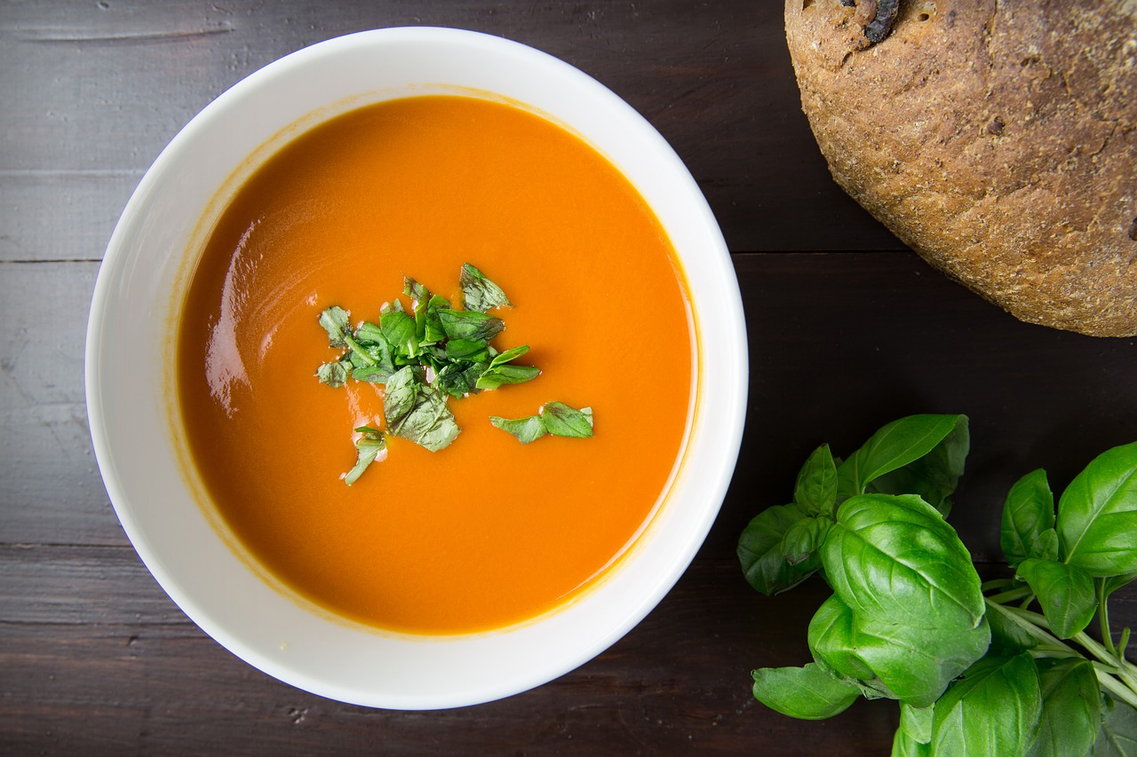 Image - soup tomato bowl overhead herbs