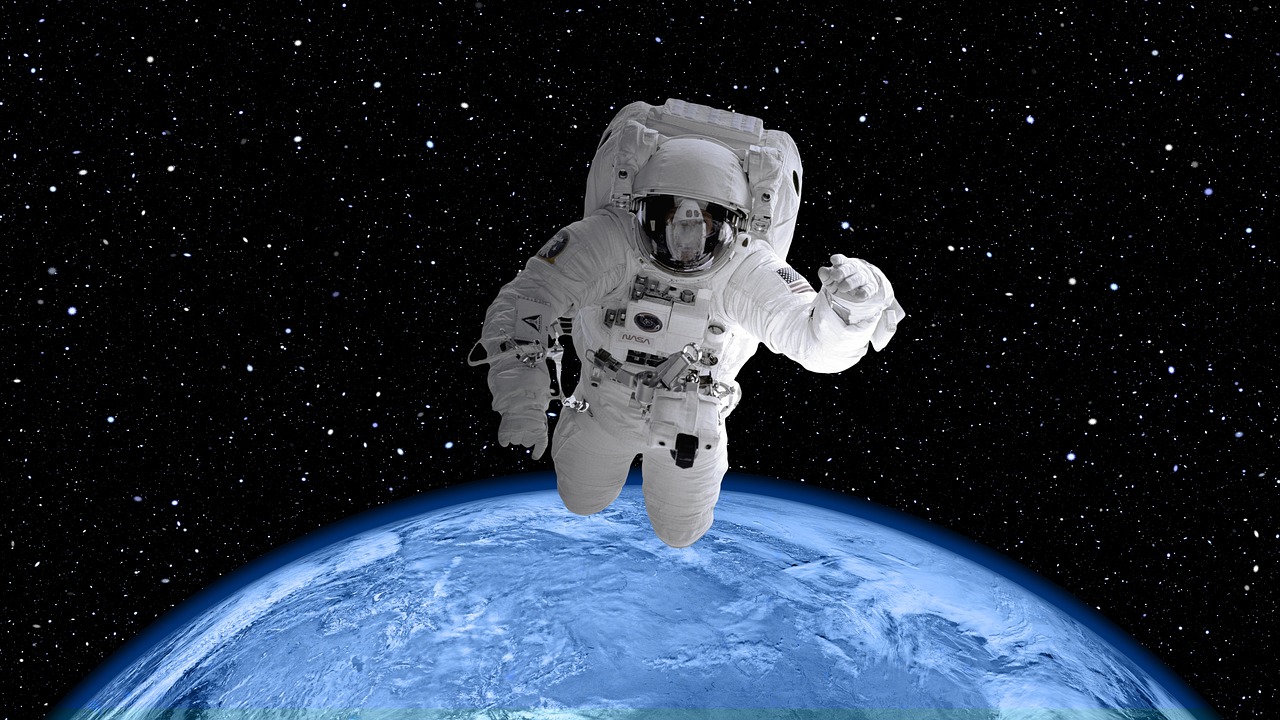 Image - space suit astronaut world earth