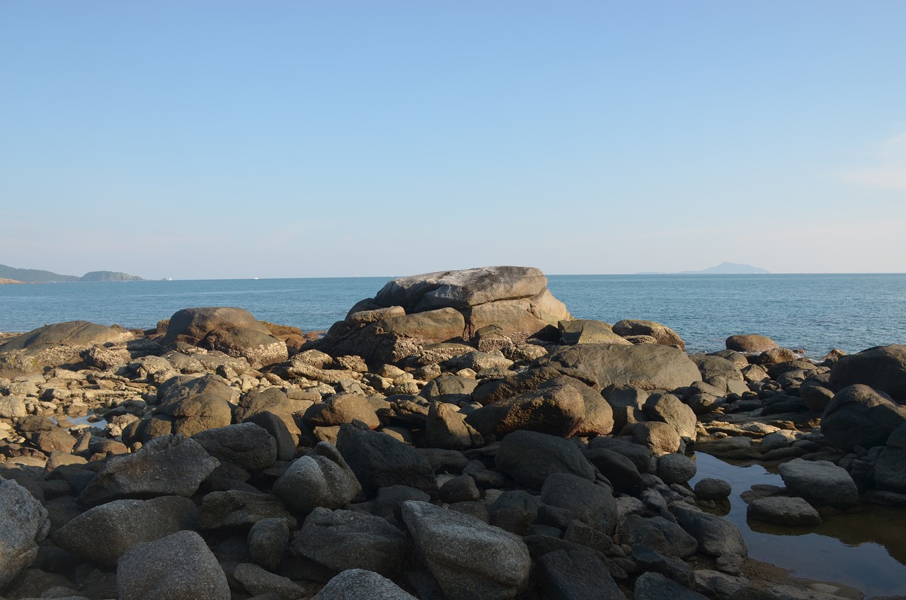 Image - stones sea pebbles horizon sunset