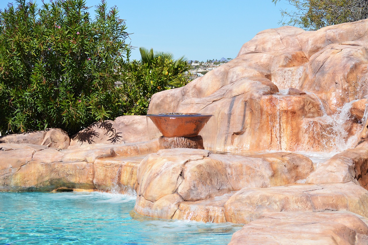 Image - backyard pool rock landscaping hot