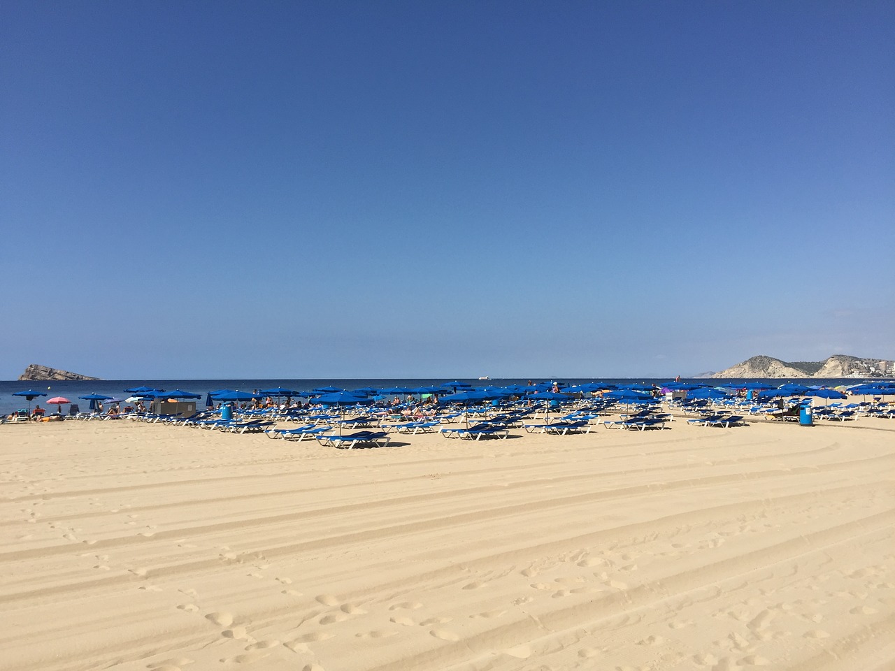 Image - benidorm sunbeds beach sand summer
