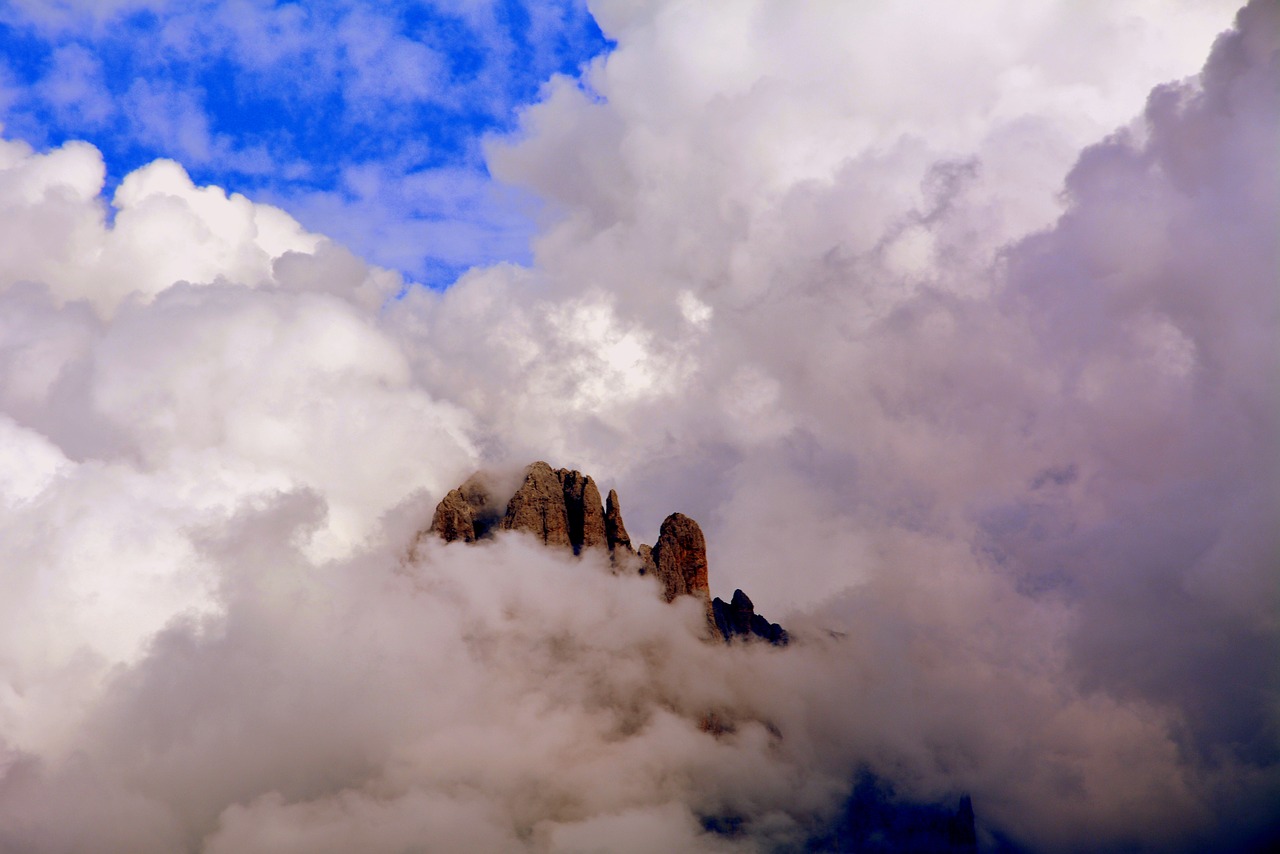 Image - top clouds dolomites sassolungo