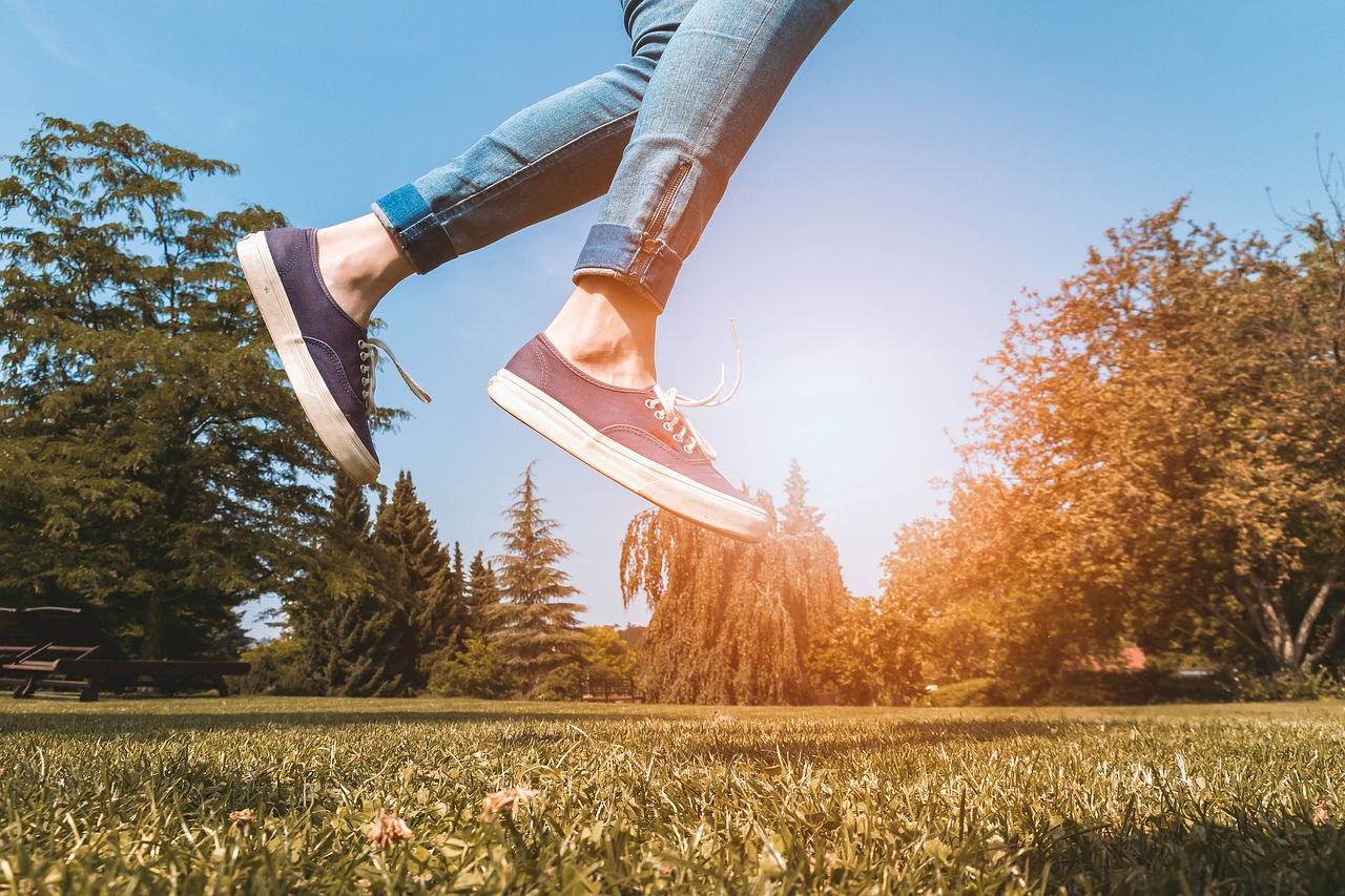 Image - happy jump young sun park green