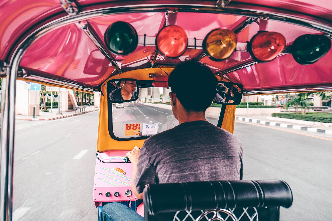 Image - people man driving tricycle road