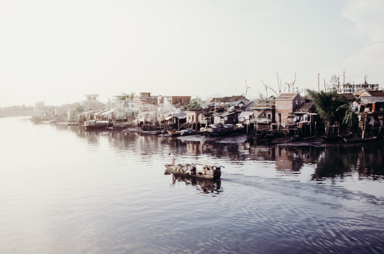 Image - boat sailing sea water houses