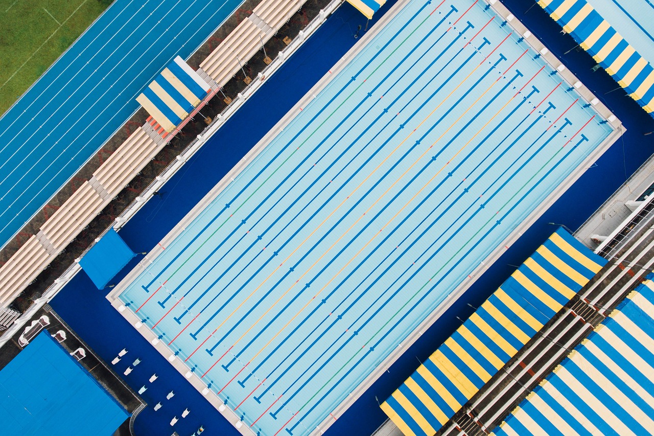 Image - swimming pool blue water aerial