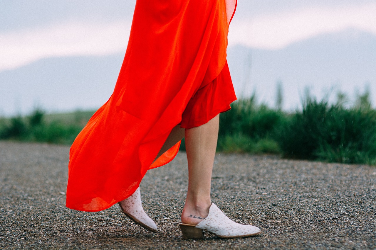 Image - people woman orange dress sandals