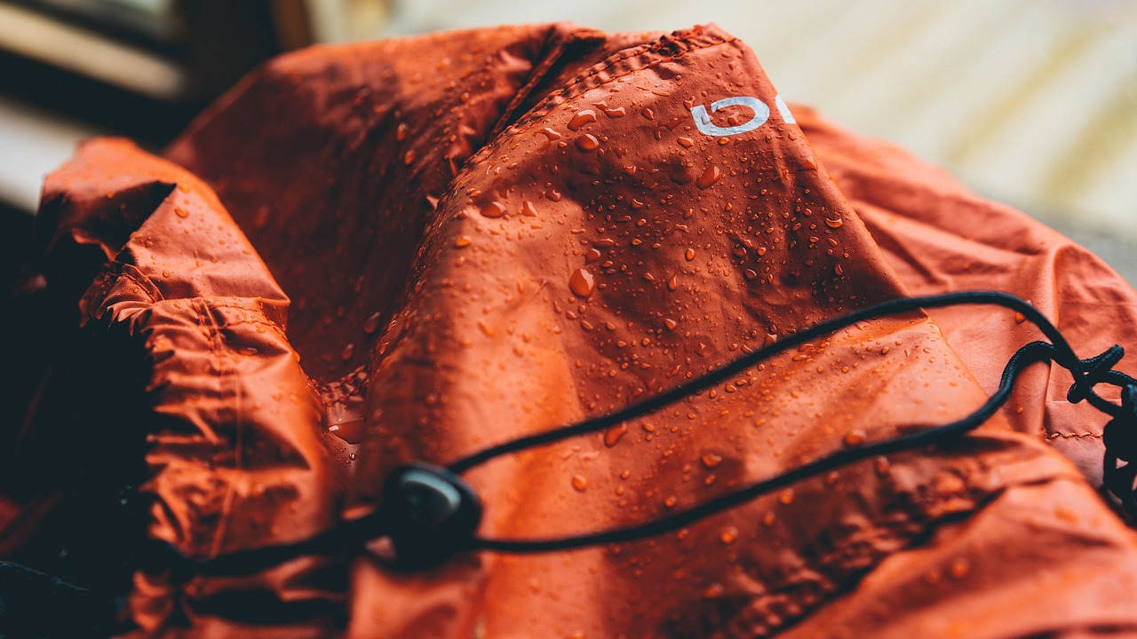 Image - red jacket wet water drops