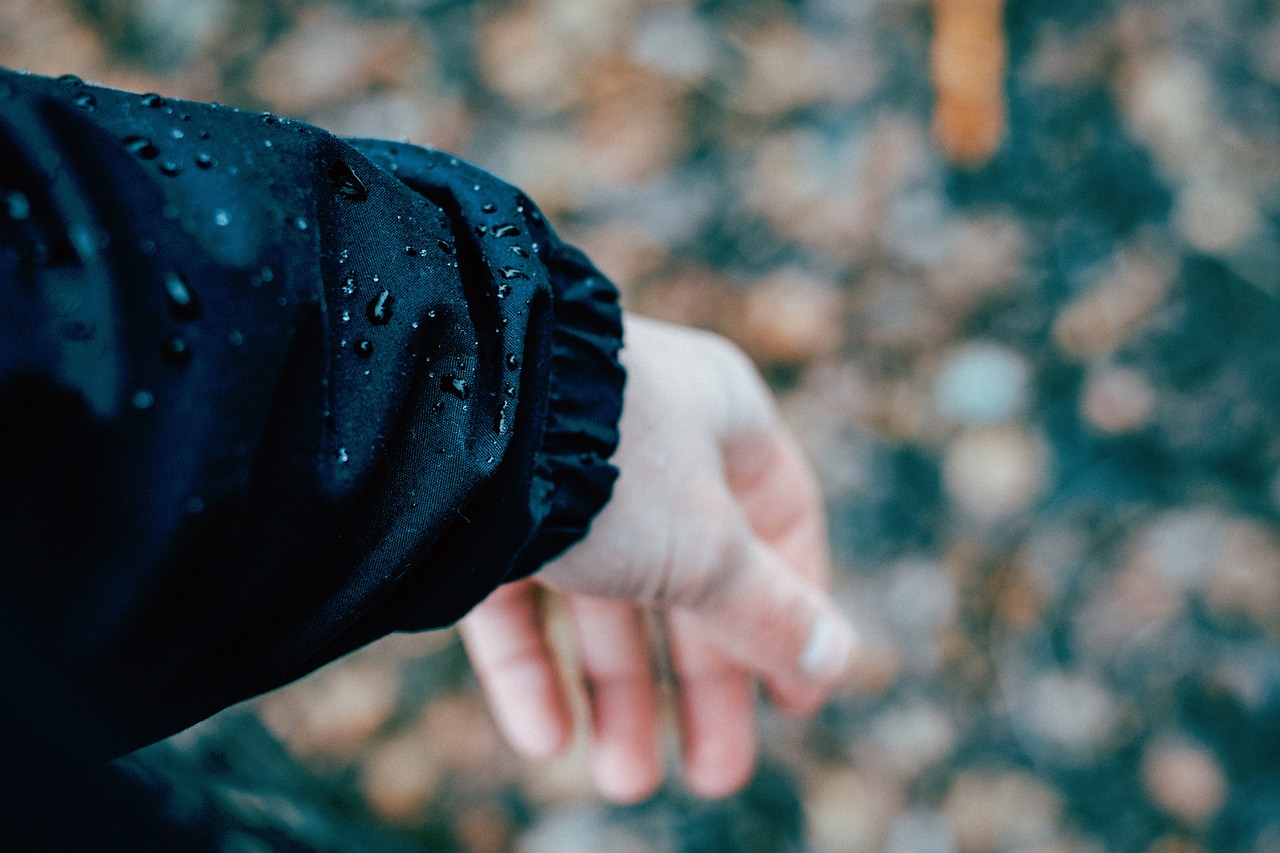 Image - people hands jacket water droplets