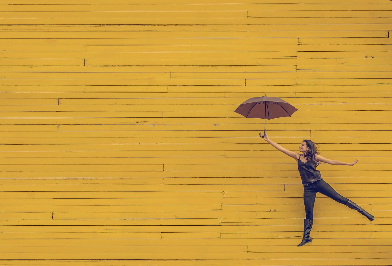 Image - yellow wood wall umbrella people