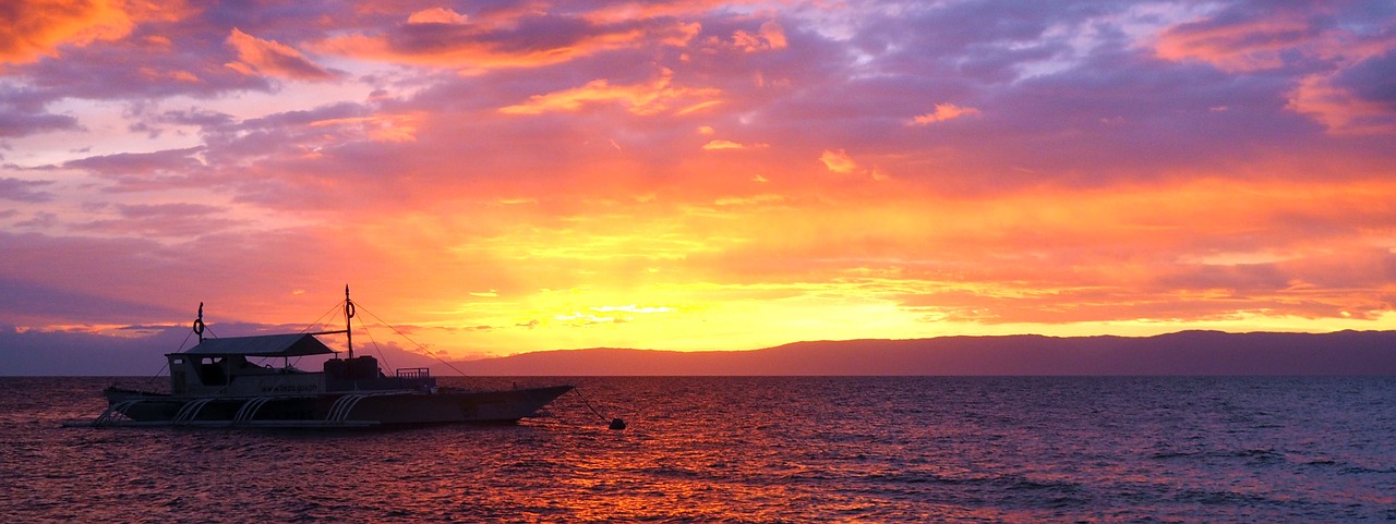 Image - sunset reflections boat ocean