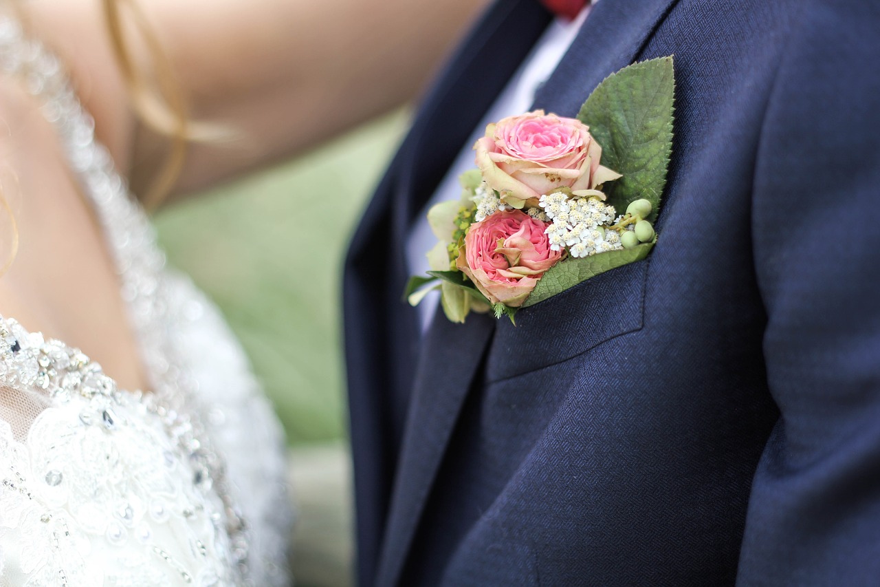 Image - people couple suit coat flower