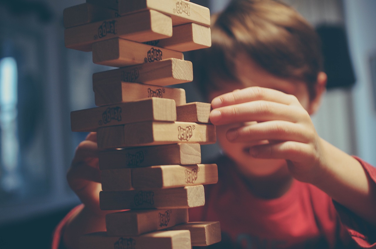 Image - jenga game play hand boy kid