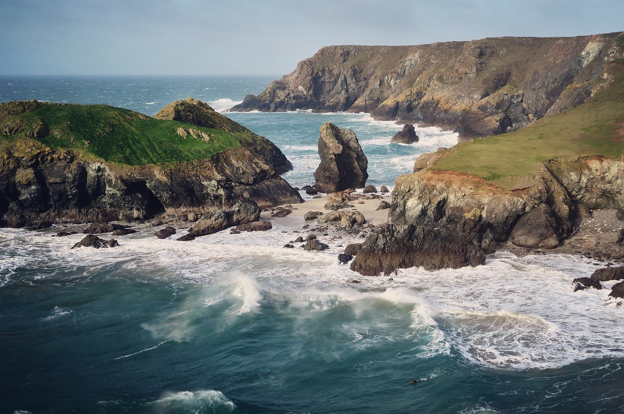 Image - cliff rocks hill sea blue water