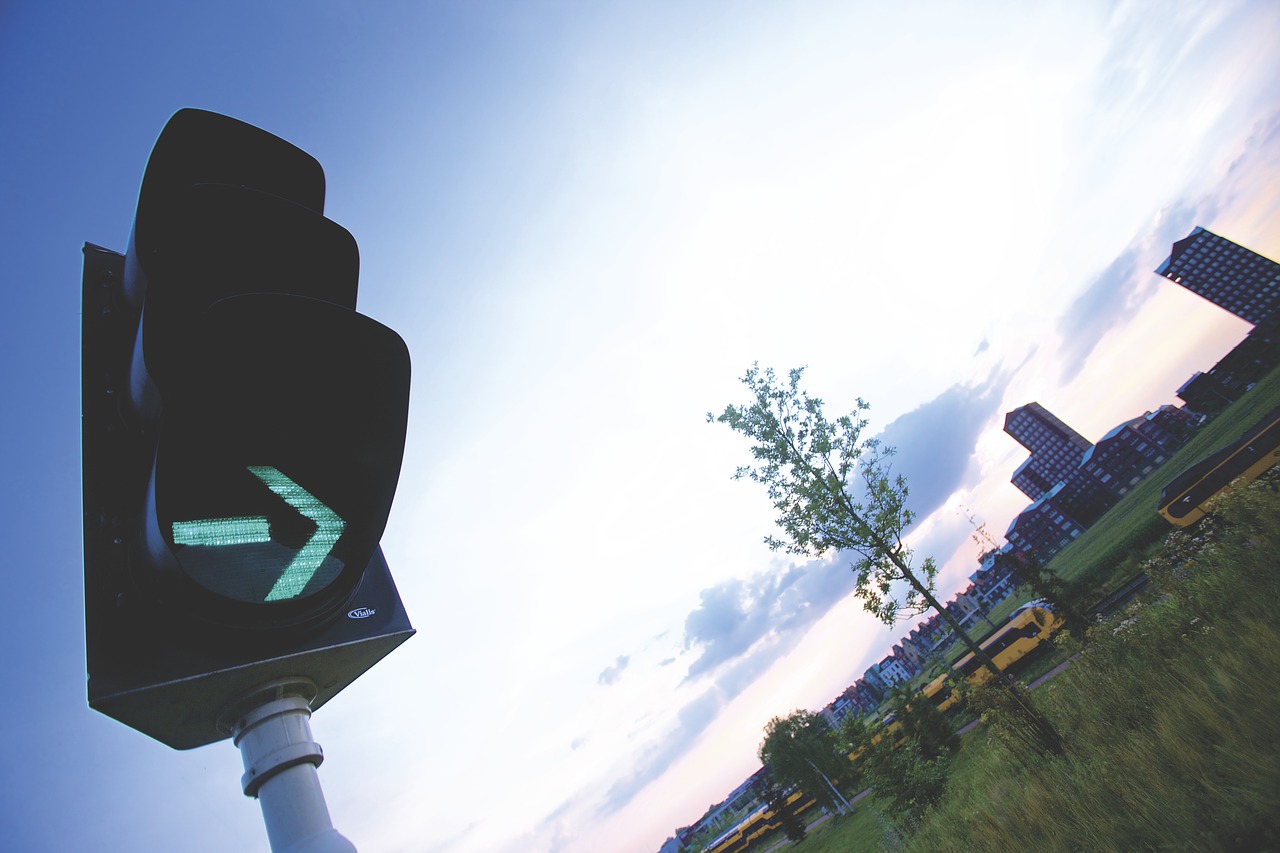 Image - green traffic light go clouds sky