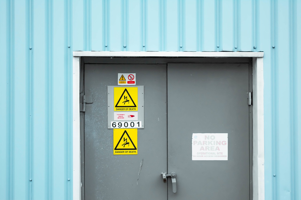 Image - danger warnings signage door steel