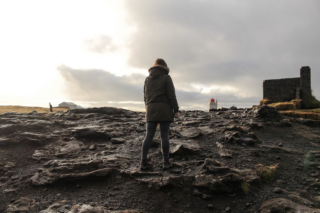 Image - people man rocks jacket clouds