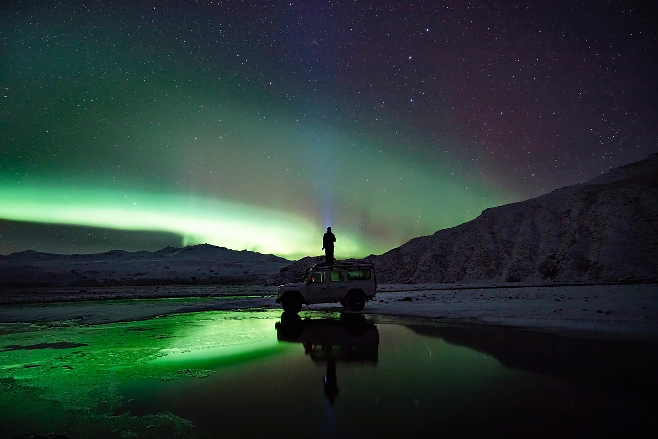 Image - green aurora borealis people man