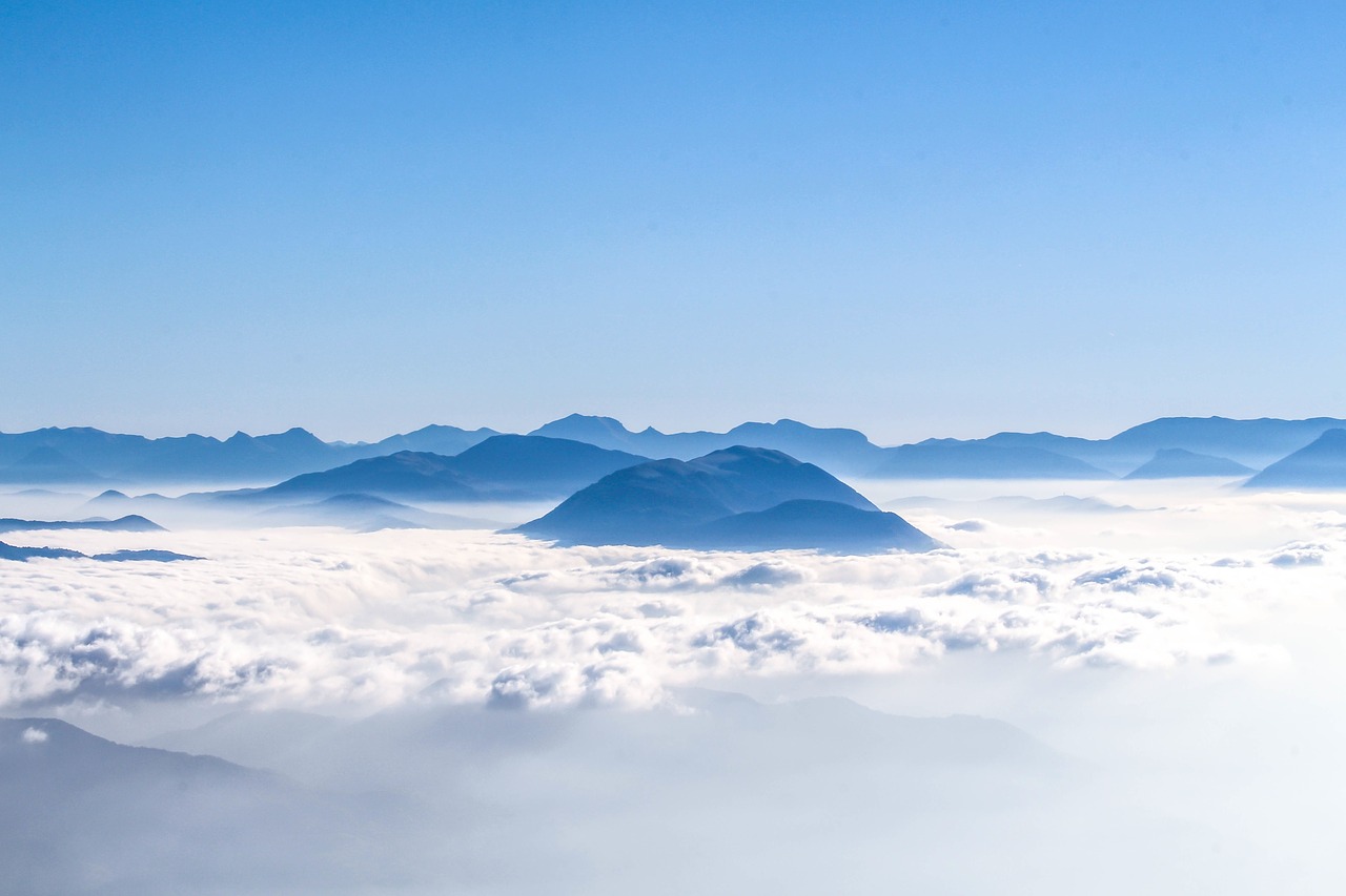 Image - aerial mountain clouds sky blue