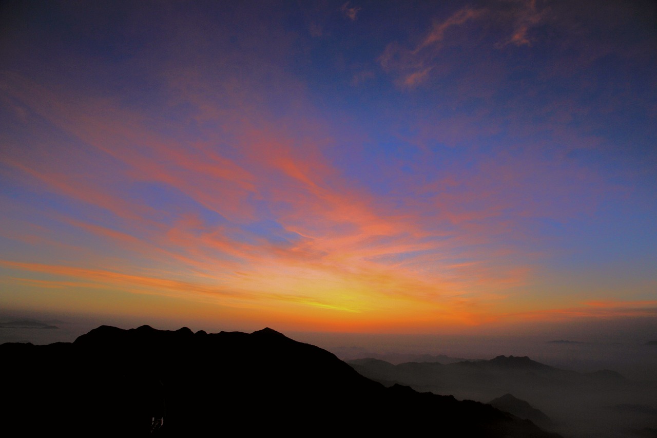 Image - sunrise clouds four people with