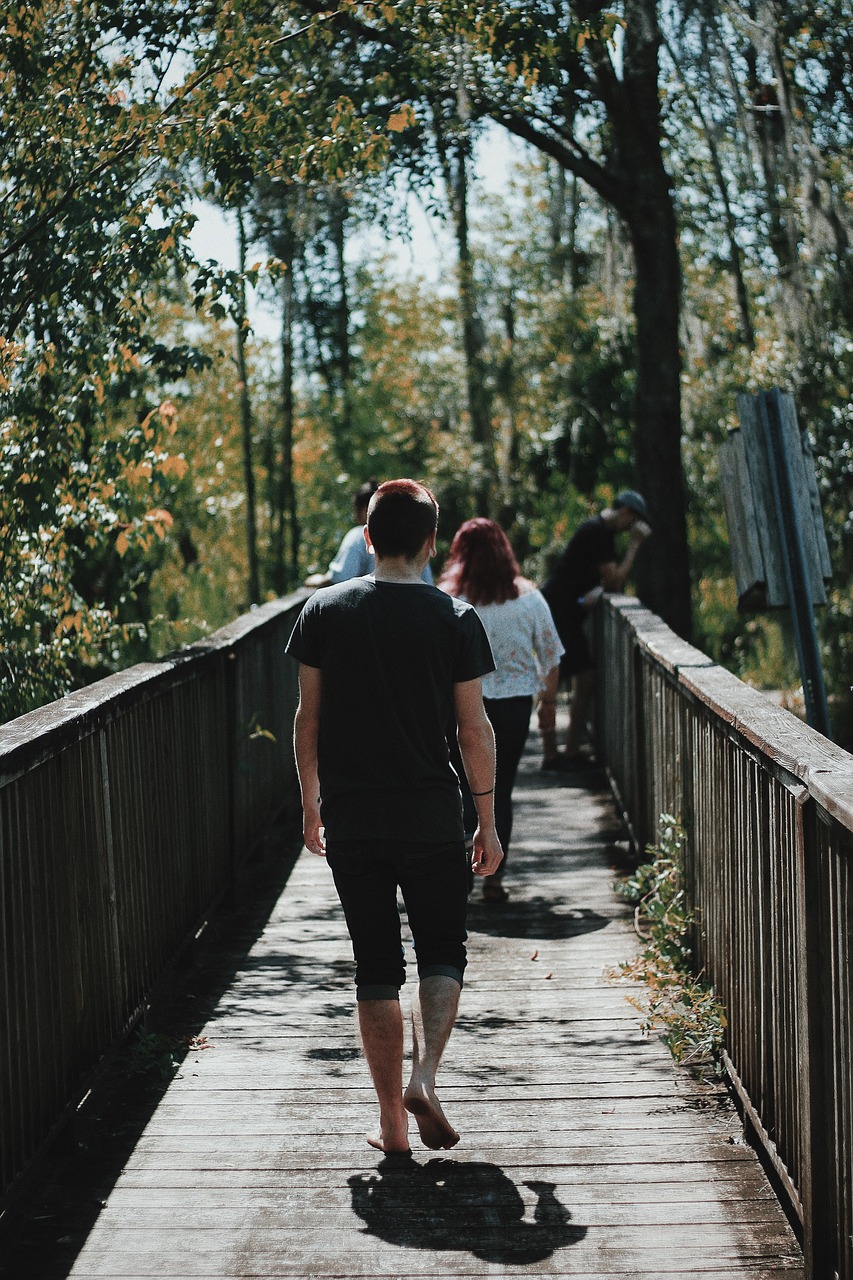 Image - bridge people man woman sunlight