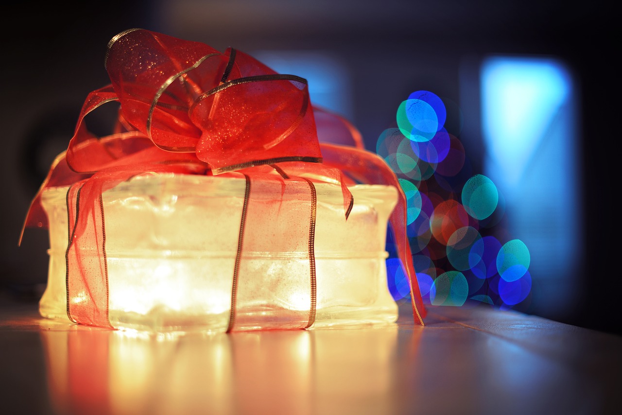 Image - red ribbon gift light bokeh blur