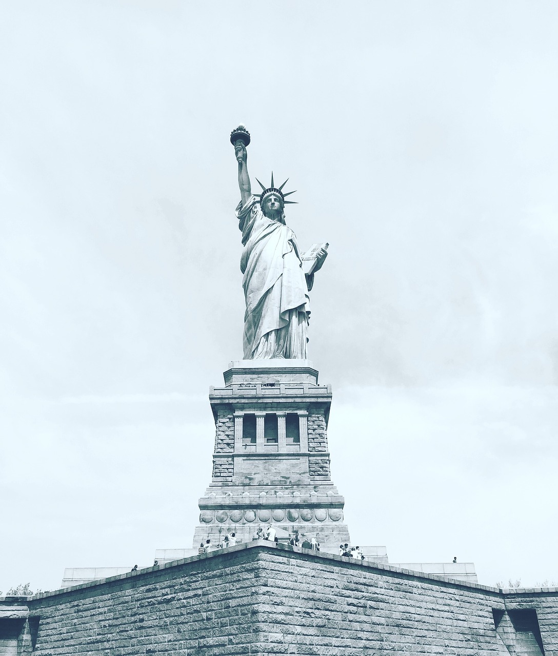 Image - liberty statue blue sky clouds