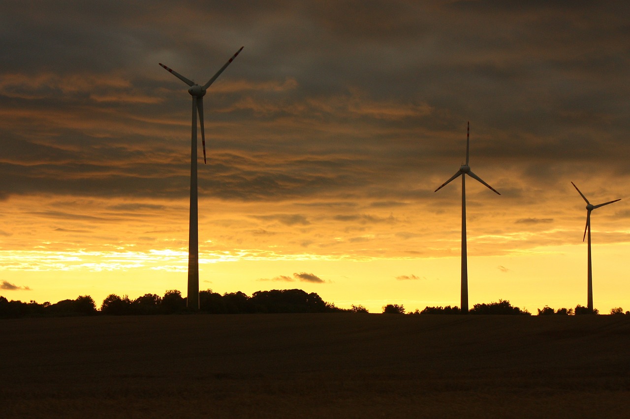 Image - windmill structure dark sunset sky