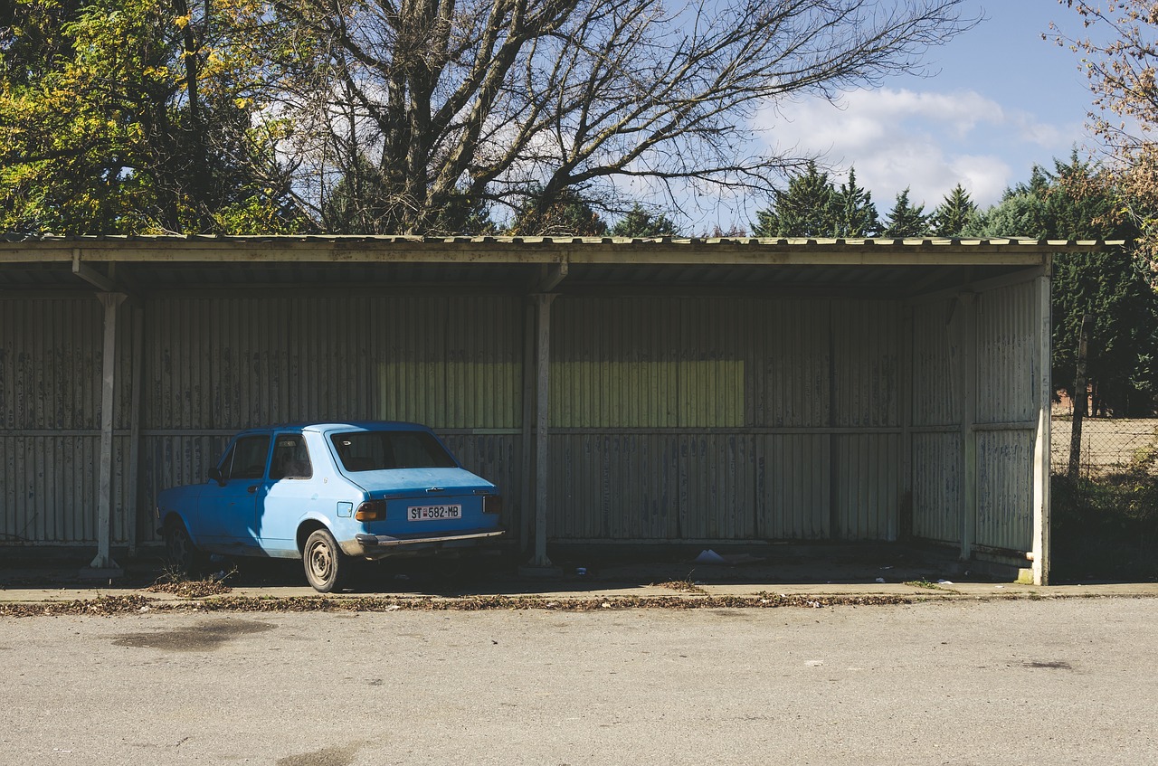 Image - blue vehicle car parking shed