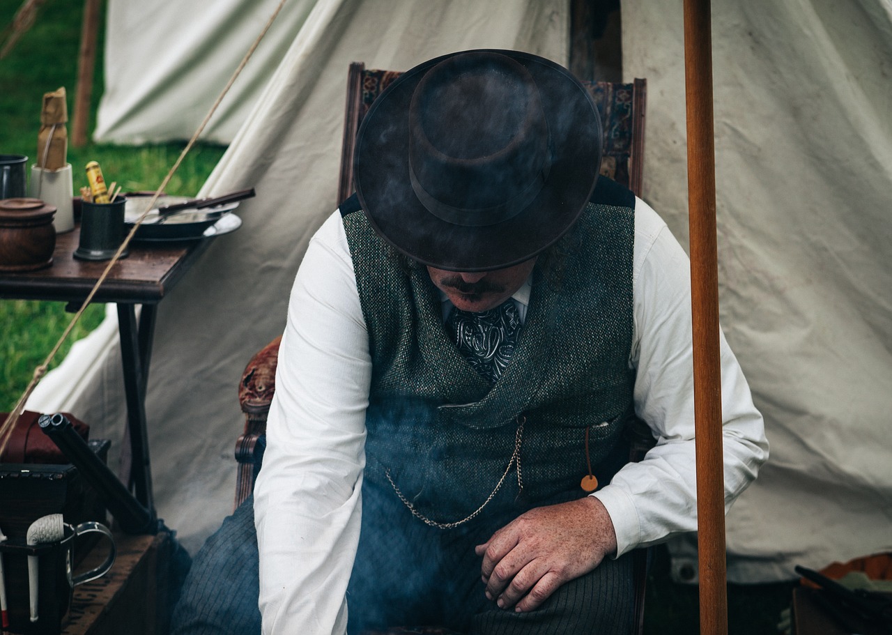 Image - people man sitting camp field