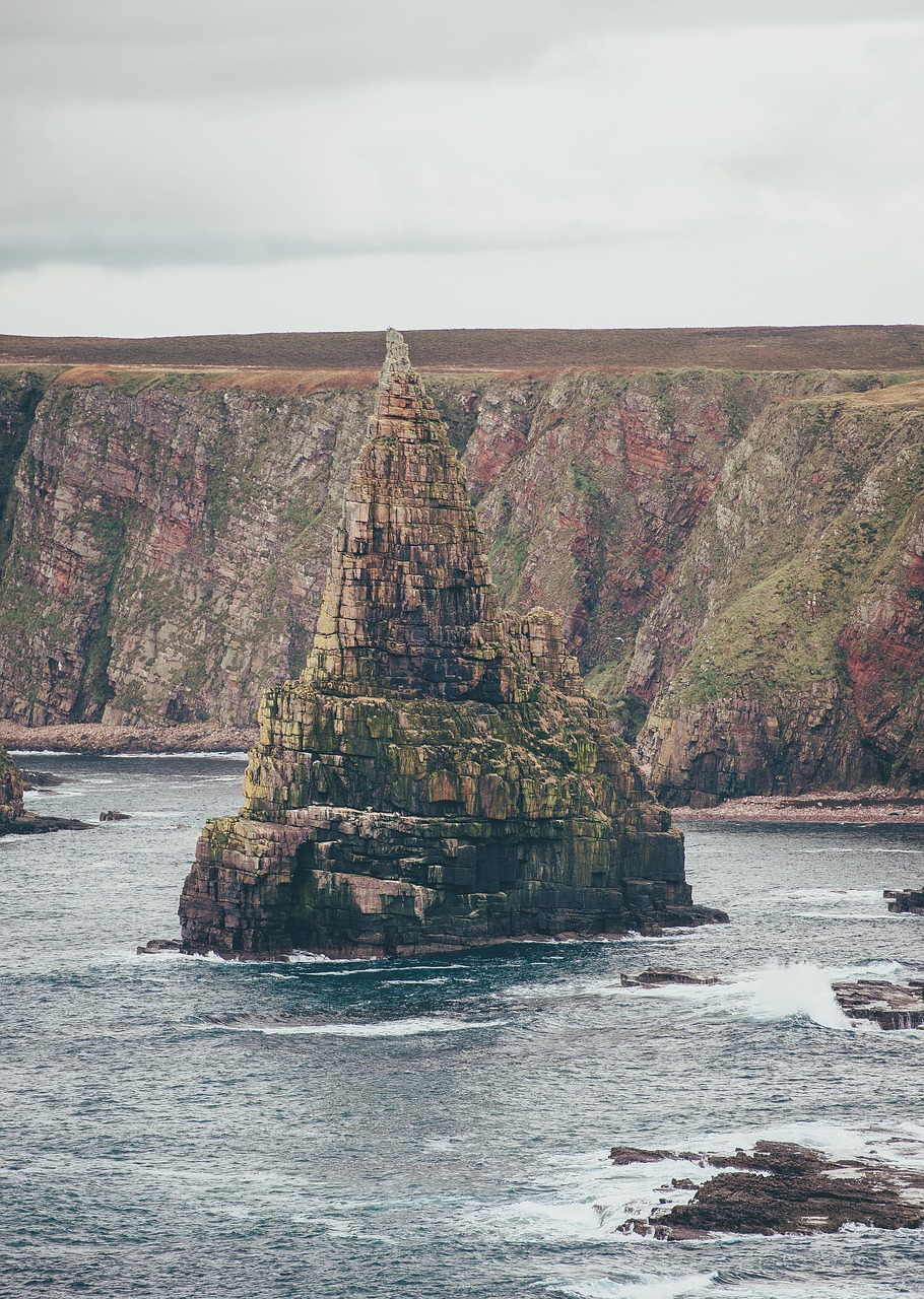 Image - rock formation grass hill highland