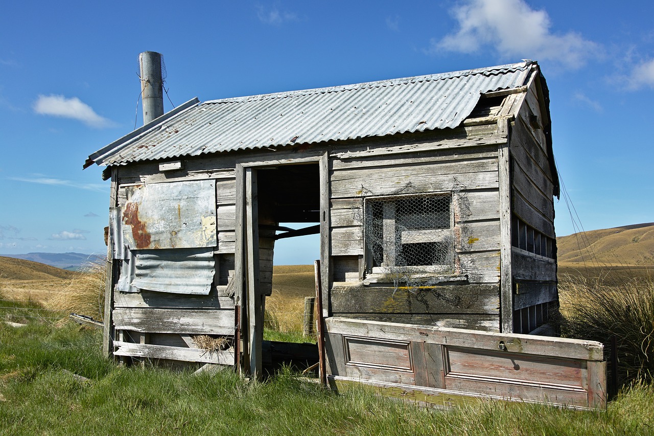 Image - green grass hut highland blue sky