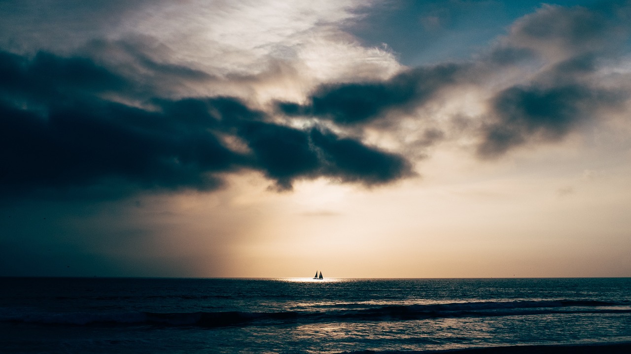 Image - dark clouds sky horizon boat