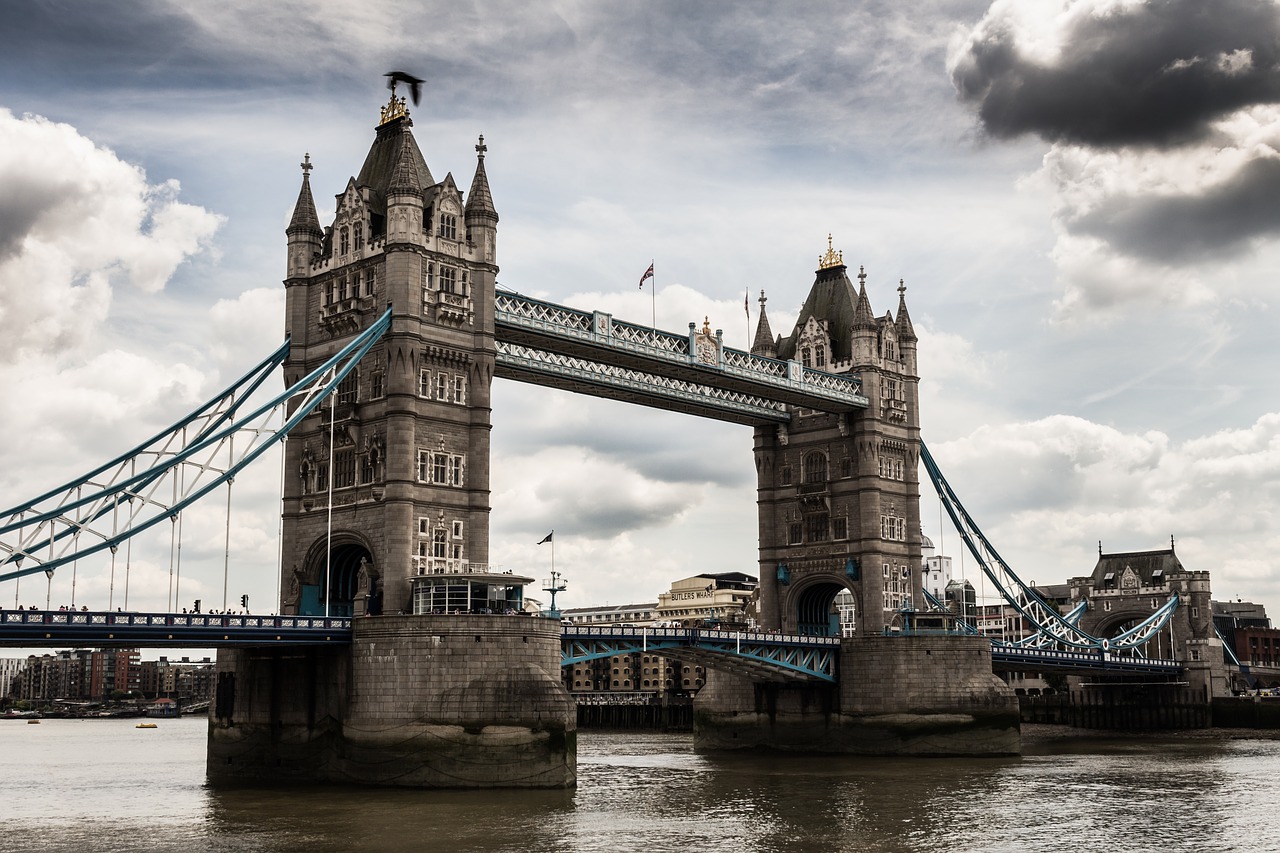 Image - cloudy sky bridge building