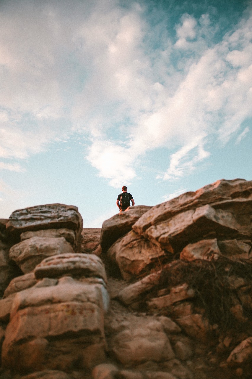 Image - rock formation people man alone