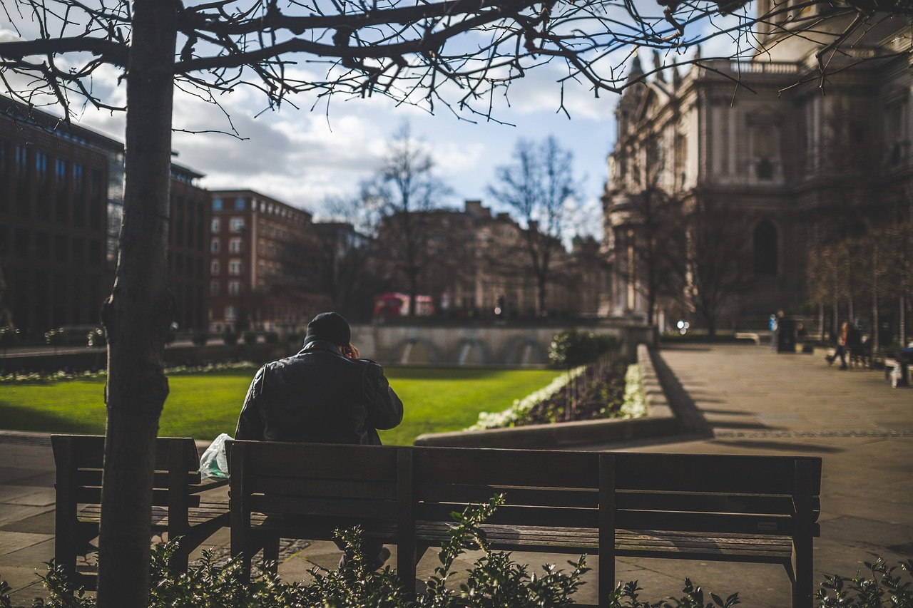 Image - guy sitting park bench waiting