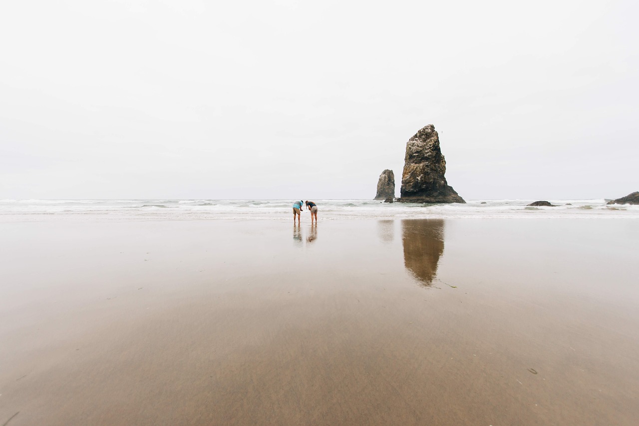 Image - people rock formation sand beach