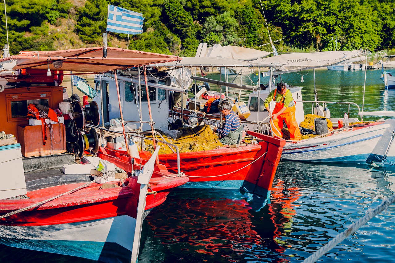 Image - blue red boat people men sea