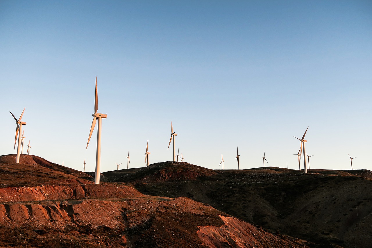 Image - windmill turbine clouds sky soil