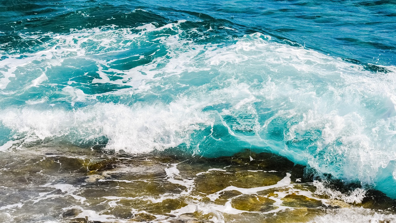 Image - shades of blue wave smashing foam