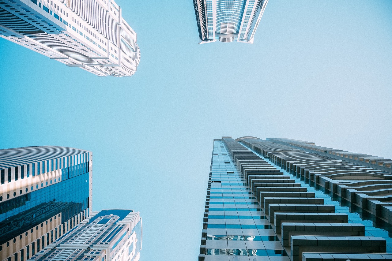 Image - blue sky sunshine buildings towers